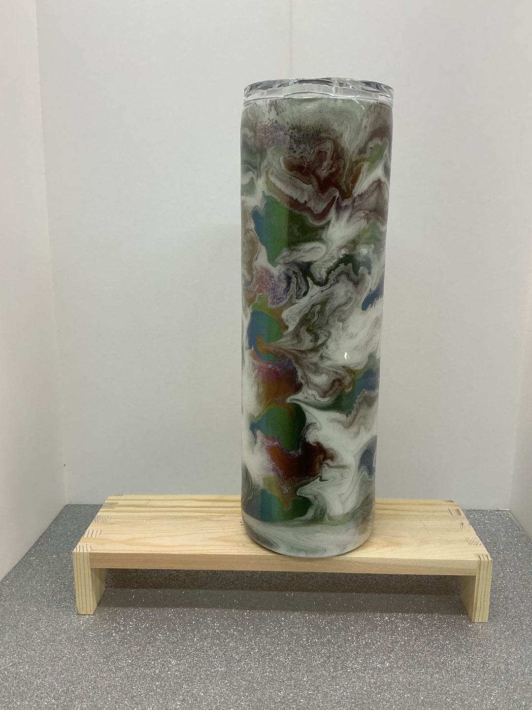 Color-changing Nancy’s Designs product showing vibrant color shift with smooth surface and sleek design.