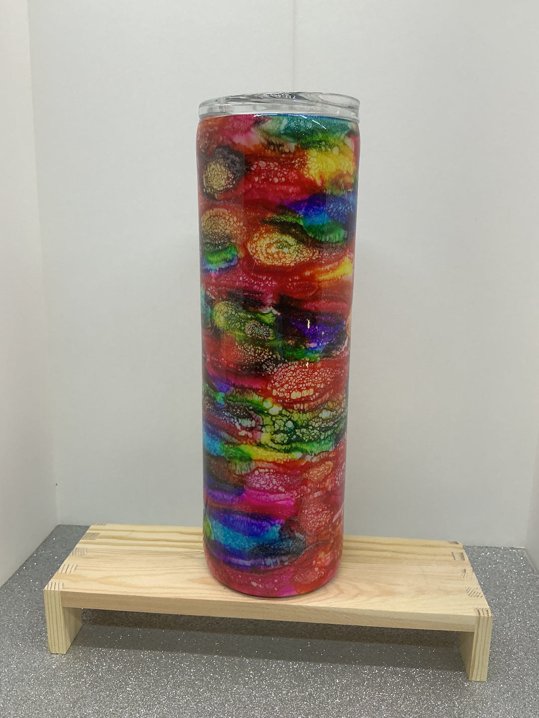 Nancy’s Designs colorful fabric swatches in various shades, displaying vibrant textile options for crafting or sewing projects.