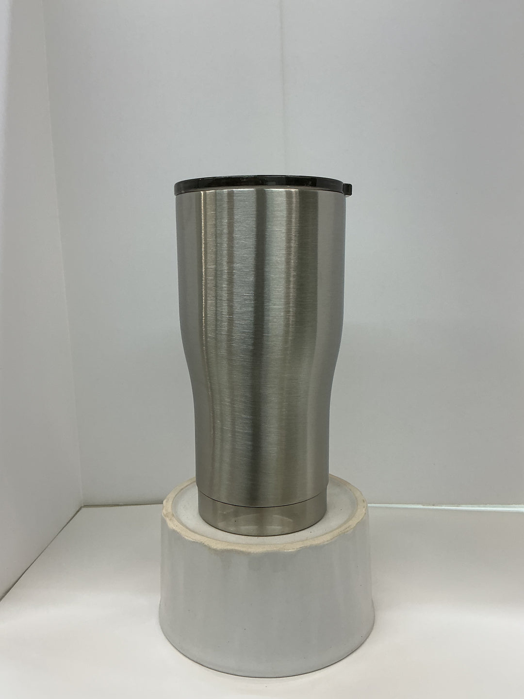20-ounce modern custom order tumbler by Nancy Designs with sleek design and personalized details visible in the image.