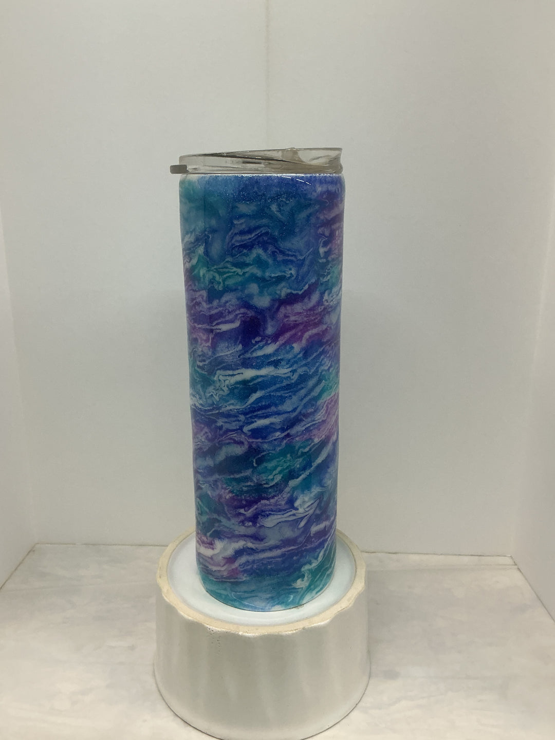 Colorful abstract cloud design by Nancy’s Designs, featuring vibrant hues and soft, swirling shapes in a visually appealing composition.