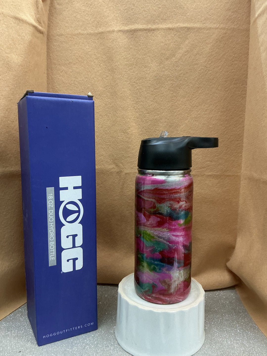 Nancy’s Designs DUO Hydro Bottle, stainless steel water bottle with dual compartments, portable and eco-friendly for active use.